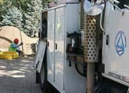 Technician working by service truck