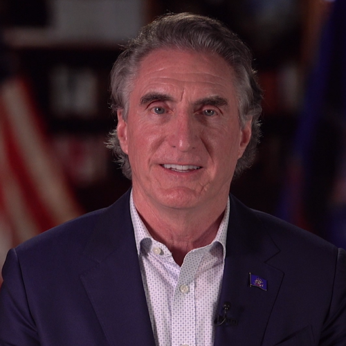 North Dakota Gov. Doug Burgum congratulates MDU Resources on 100th anniversary